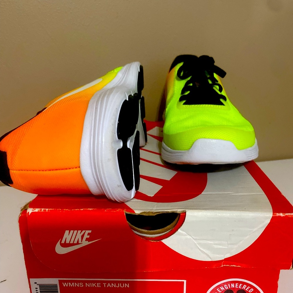 Fun bright yellow and orange Nike Tanjun ..You will be seen in these shoes !